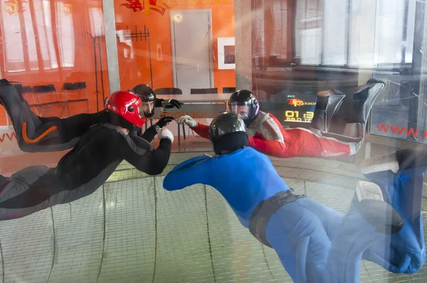 MOSCOW, RUSIIA, APRIL 11, 2012: Formation Skydiving (4-way) in a vertical wind tunnel \