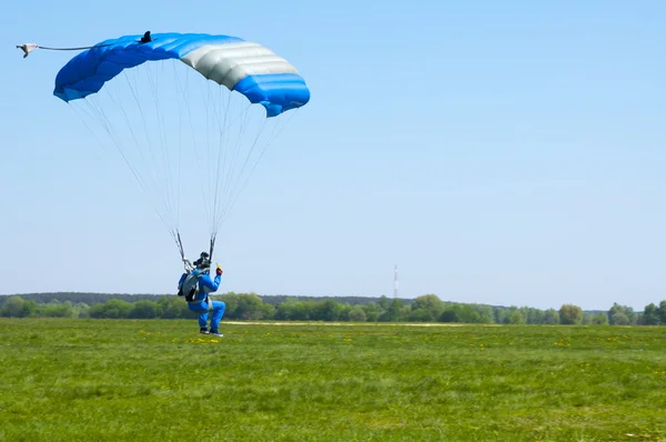 BORODIANKA, KIEV- MAY 2, 2012: parachutist lands on the airfield from an airplane L-410, on May 2, 2012, Borodianka, Ukraine