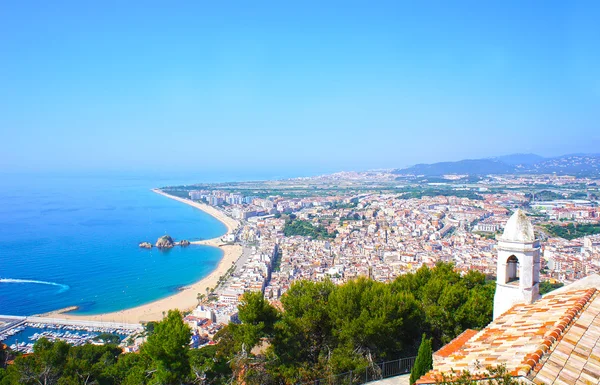 View of Spanish beach of resort town Blanes in summertime. Costa Brava, Catalonia, Spain