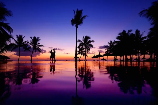Young couple at scenic sunset