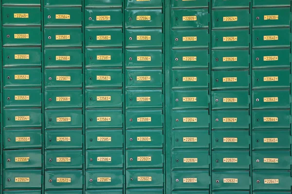 Green post boxes at post office