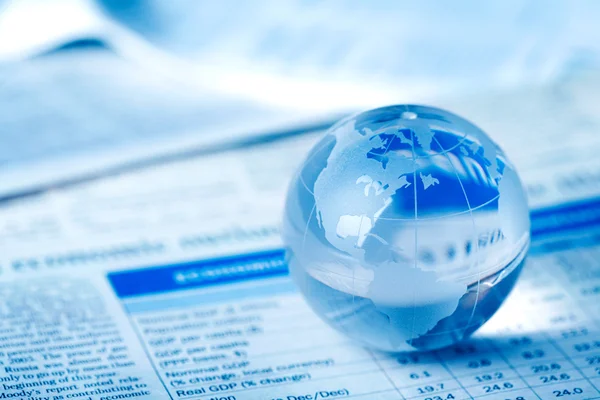 Glass globe on business table