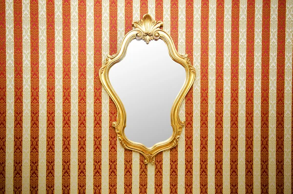 Ornate mirror on the wall