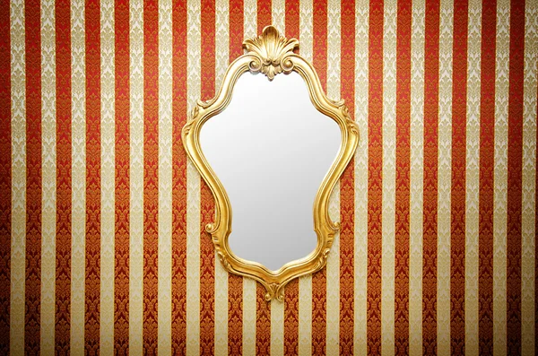 Ornate mirror on the wall