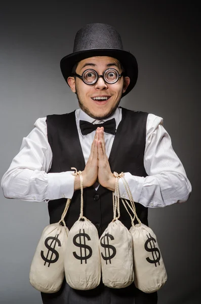 Man with sacks of money