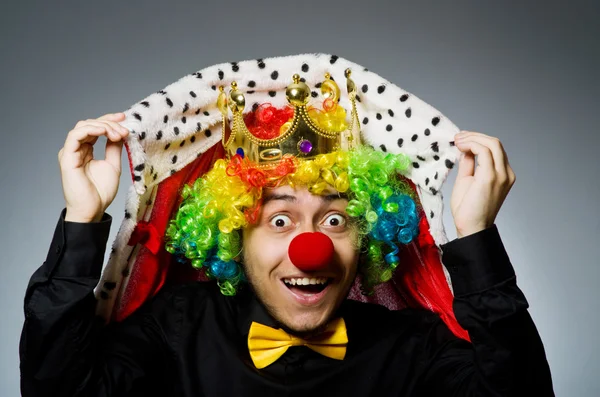 Businessman in King clown costume