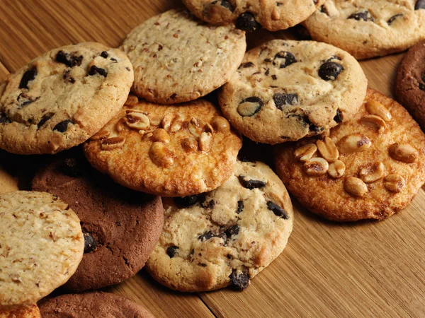 Cookies over wooden background