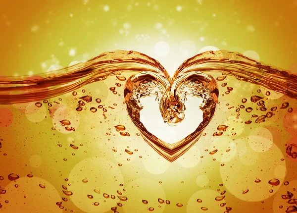 Heart from water splash with bubbles