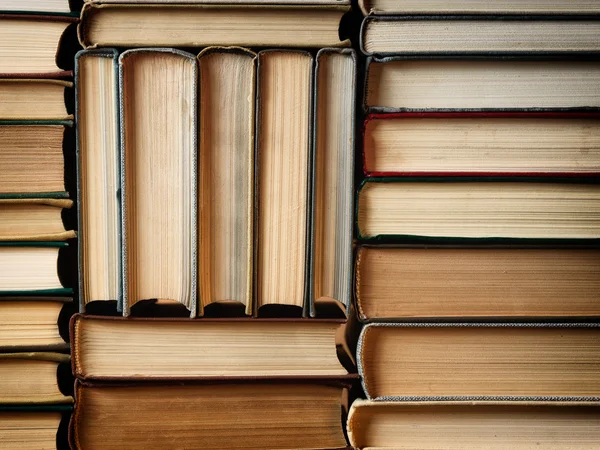 Old books arranged in stacks