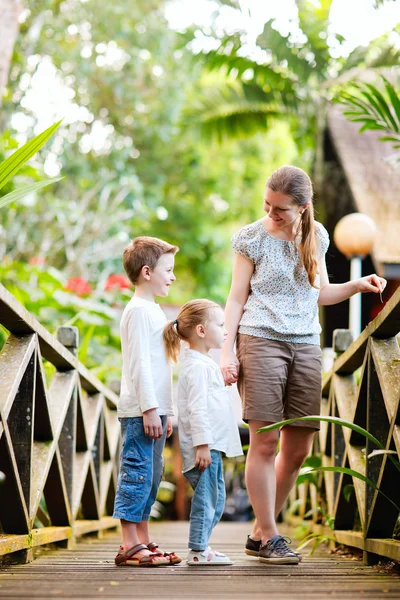 Family at tropical jungle resort