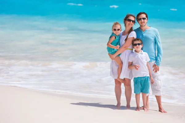 Family on a tropical beach vacation