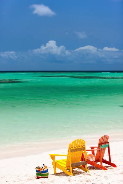 Colorful lounge chairs at Caribbean beach