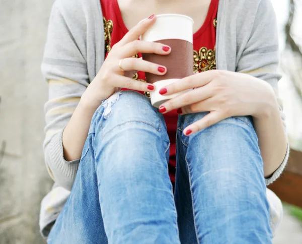 Drinking coffee outdoors