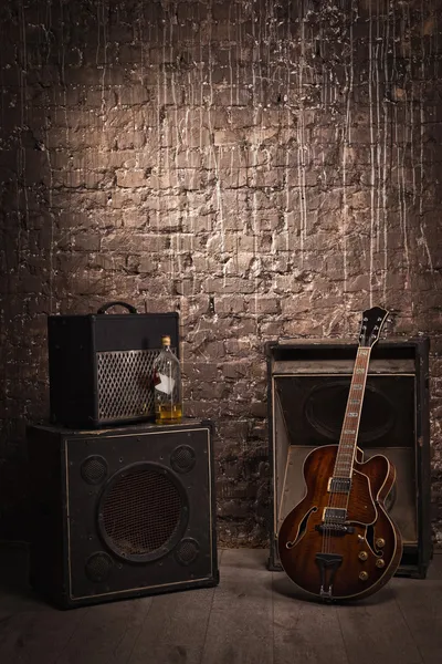 Electric guitar and old amplifier