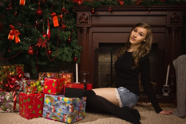 Young girl with Christmas gifts