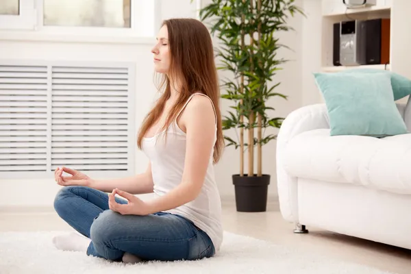 Woman sitting on floor