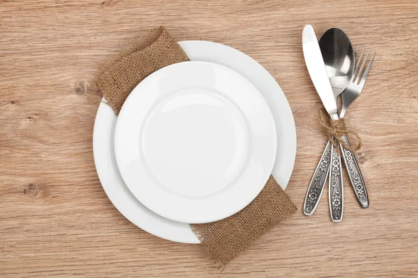 Empty plate and silverware set