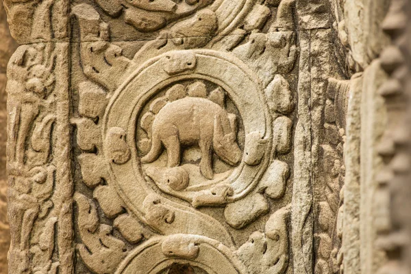 Relief on the wall   at Angkor Wat