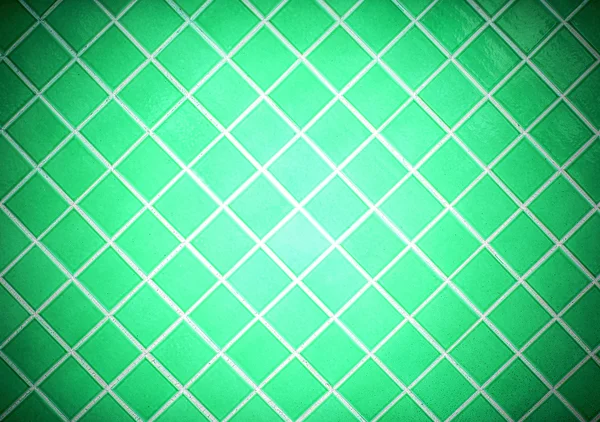 Colored tile wall background. Green