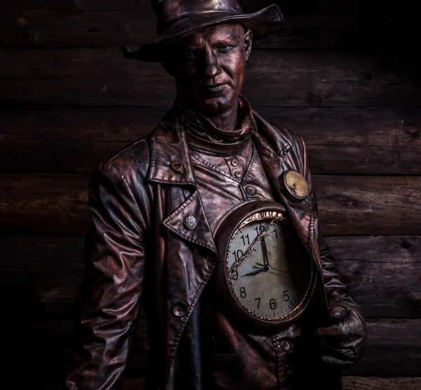 Image of watchmaker in bright fantasy stylization. Fairy tale art photo on grunge wooden background.