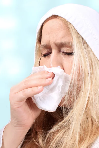 Woman with sniffles or sneezing