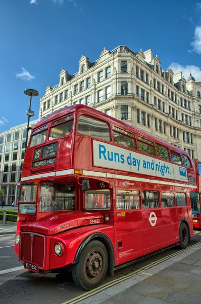 LONDON, SEP 28: Red double decker bus speeds up on the streets o — Stock Photo #14444157