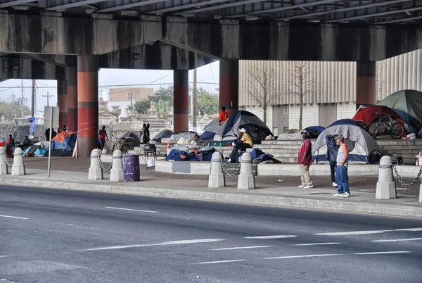 NEW ORLEANS - MAR 24: Homeless prepare to spend the night