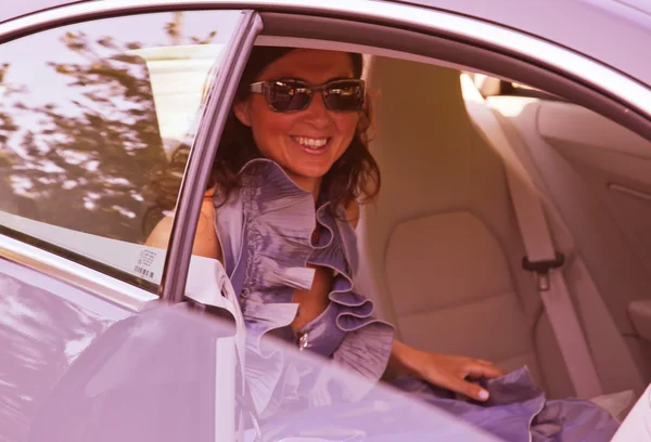 Bride in the Car before Wedding Ceremony