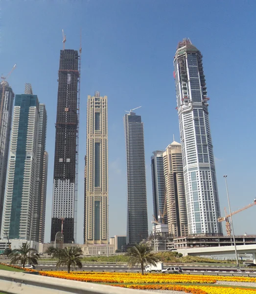 Dubai. Street view of tall buildings and skyscrapers