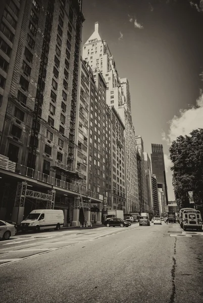 New York City. Beautiful upward view of Manhattan Skyscrapers as seen from street level.