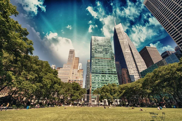 Bryant Park, New York City. Garden and trees on a beautiful summ