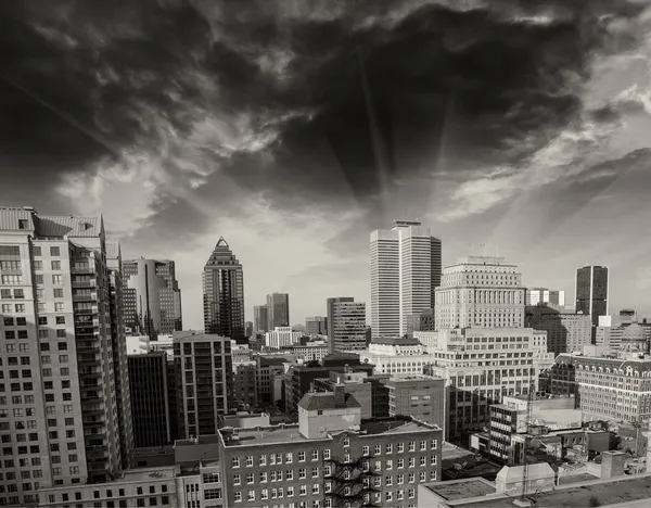 Dramatic sky above Montreal Buildings, Canada - Aerial view