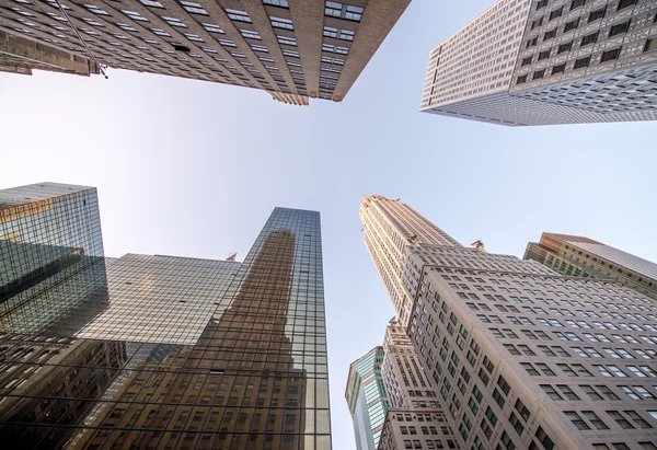 New York. Wide angle street view of modern tall skyscrapers