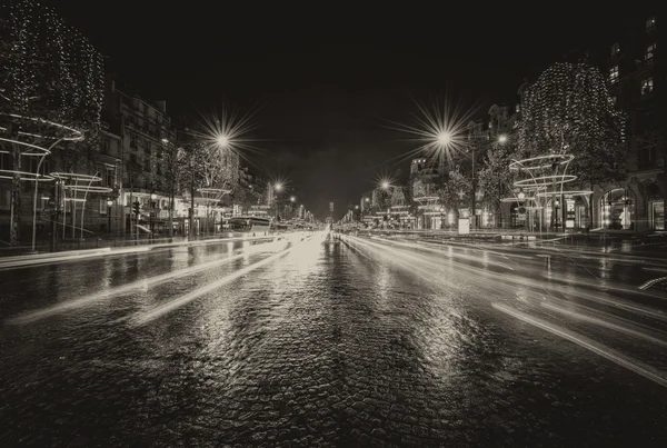 PARIS, NOV 30: Car light trails in famous Champs Elysees, Novemb