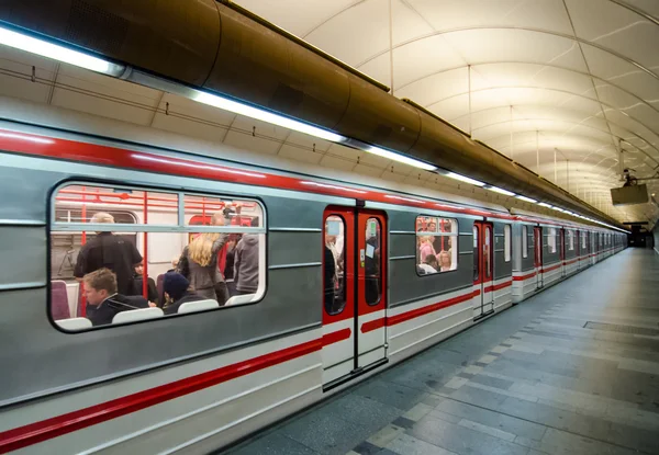 Subway train in a city station.