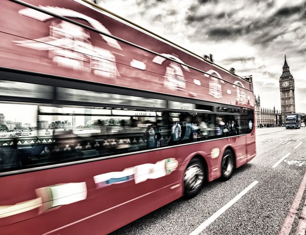 LONDON - SEP 14, 2013: Red Double Decker bus speeds up on Westmi
