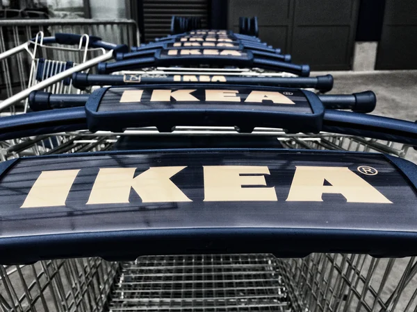 PISA, ITALY - APRIL 1, 2014: Ikea carts at shop entrance. Founde