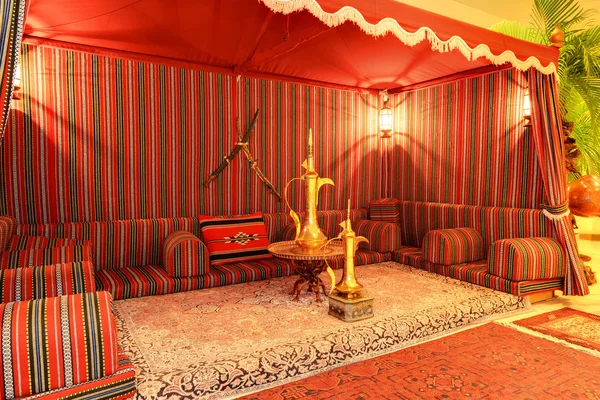 Lobby interior of the luxury hotel in night illumination, Ajman,