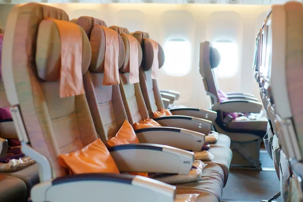 Seats in airplane cabin
