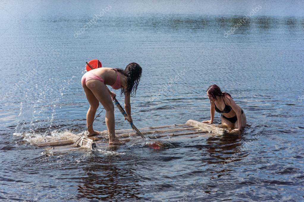 http://st.depositphotos.com/1001283/3481/i/950/depositphotos_34819925-Girls-on-a-wooden-raft.jpg