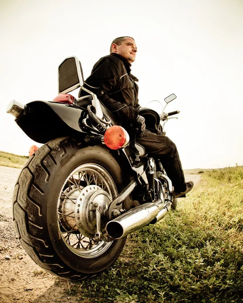 Biker on the country road