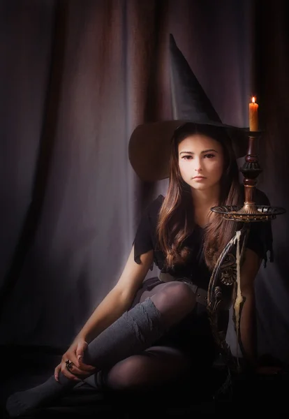 Young beautiful witch