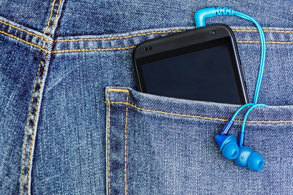 HTC Mobile Phone in a jeans pocket
