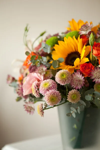 Floral bouquet with lily, sunflower, chrysanthemum, eustoma (lis