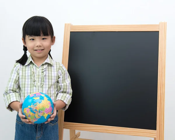 Student with globe and black board