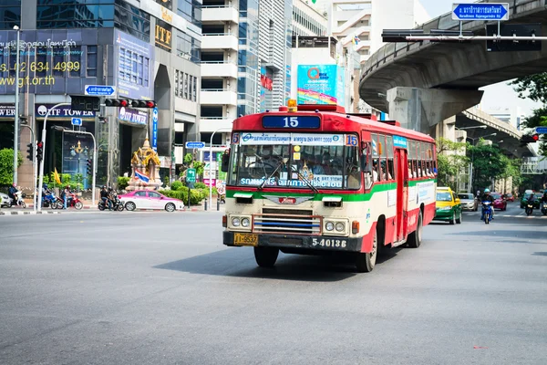 Public red bus on Bangkok street