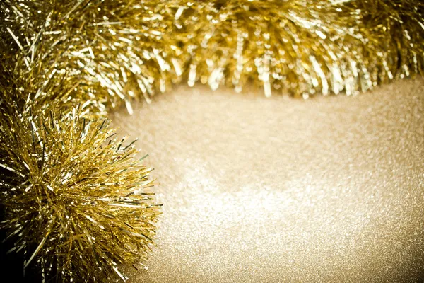 Festive garland on sparkles background