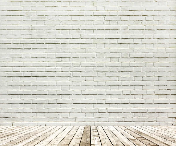 Background of aged grungy textured white brick and stone wall wi