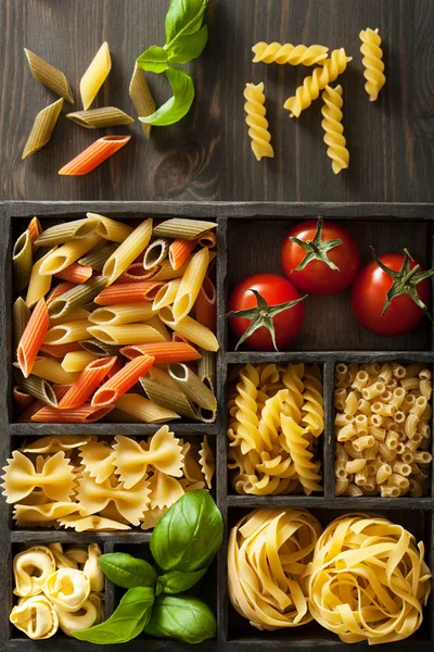 Various pasta in black wooden box