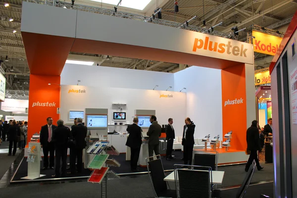 HANNOVER, GERMANY - MARCH 13: The stand of Plustek on March 13, 2014 at CEBIT computer expo, Hannover, Germany. CeBIT is the world\'s largest computer expo